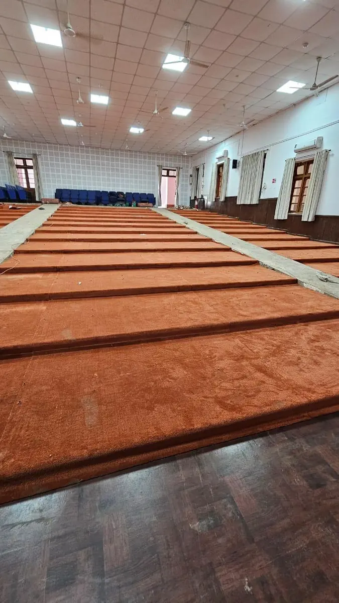 Velvet Sapphire carpet installation in a Mumbai conference hall